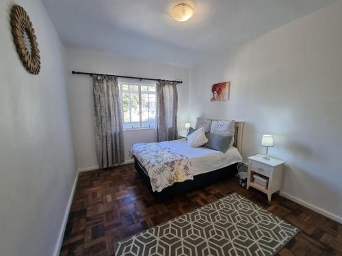 En eller flere senge i et værelse på South End Haven