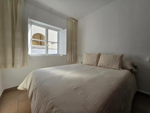 Giường trong phòng chung tại La Casita de Carmen Níjar