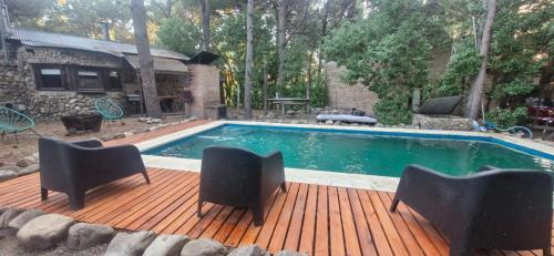 Swimmingpoolen hos eller tæt på Cabañas El Secreto