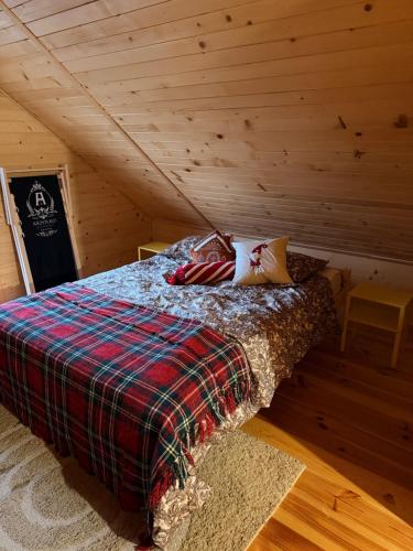 Giường trong phòng chung tại Agroturystyka AKPólko