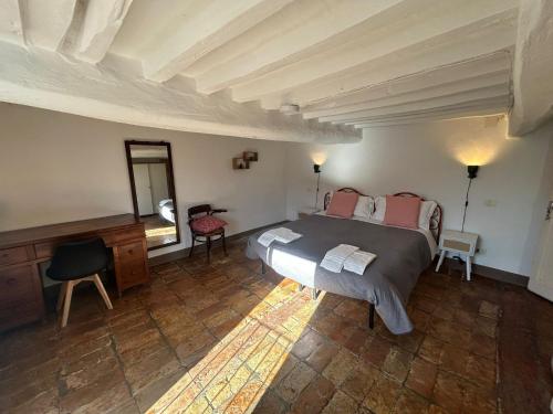 Postel nebo postele na pokoji v ubytování Loft Palazzo De Antaldis