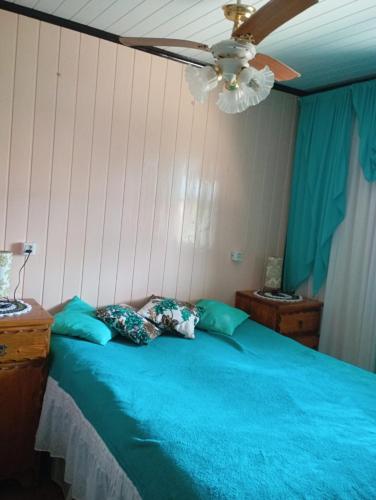 Ένα ή περισσότερα κρεβάτια σε δωμάτιο στο Casa de praia