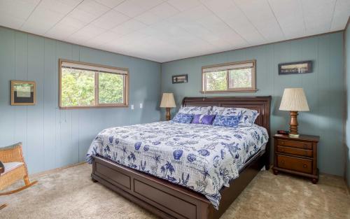 Ένα ή περισσότερα κρεβάτια σε δωμάτιο στο Ocean Breeze