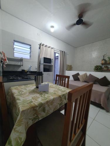 Et opholdsområde på Casa superior - aconchegante e bom custo benefício