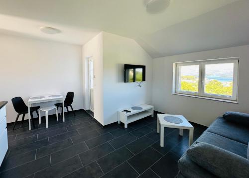 Et opholdsområde på Robić Apartments 2