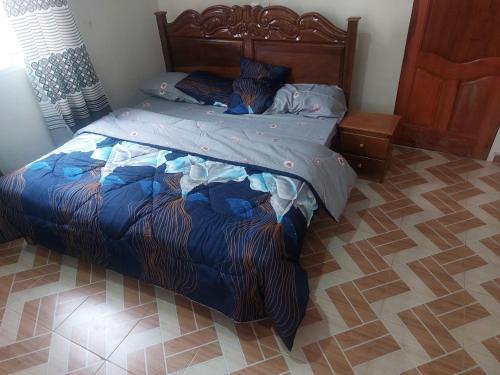 Giường trong phòng chung tại Havenstone Suite