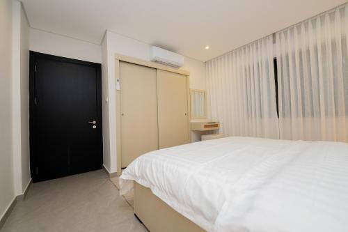 Maria Suites 2 객실 침대