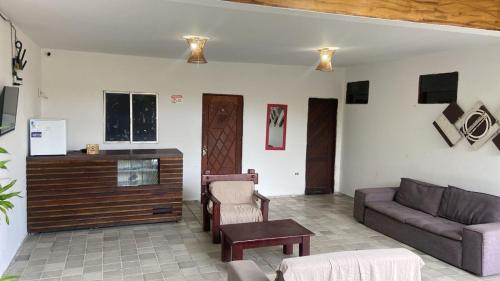 Posezení v ubytování Pousada Oasis do Frances