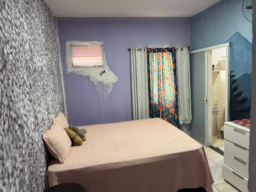 Ένα ή περισσότερα κρεβάτια σε δωμάτιο στο Casa área Gourmet conforto Jacuzzi beiraMar Búzios