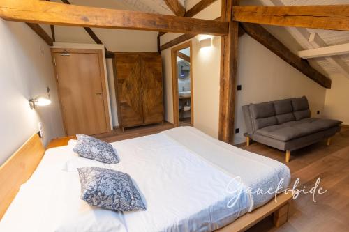 Ένα ή περισσότερα κρεβάτια σε δωμάτιο στο Ganekobide