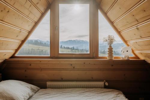 Кровать или кровати в номере 'Góralskie Zacisze' z sauną