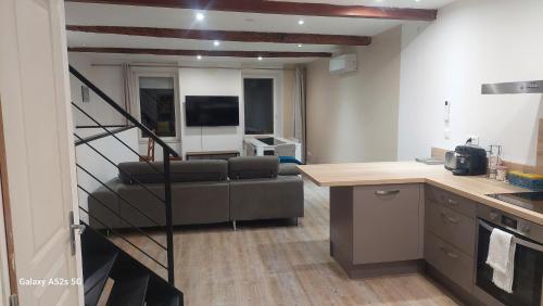 Η κουζίνα ή μικρή κουζίνα στο Le duplex sigeannais