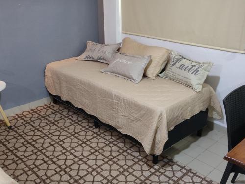 Postel nebo postele na pokoji v ubytování Monoambiente Eldorado 1