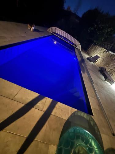 Het zwembad bij of vlak bij Villa Merma