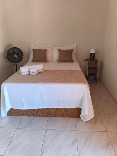 En eller flere senge i et værelse på Refúgio do córrego