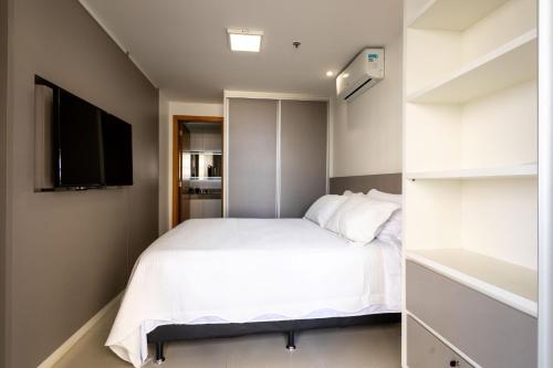 En eller flere senge i et værelse på Complexo DF PLAZA Shopping - Stay in Brasilia's best complex