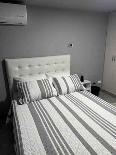 Ένα ή περισσότερα κρεβάτια σε δωμάτιο στο Apartaestudio