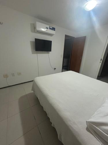 Postel nebo postele na pokoji v ubytování APARTAMENT BEACH FORTALEZA