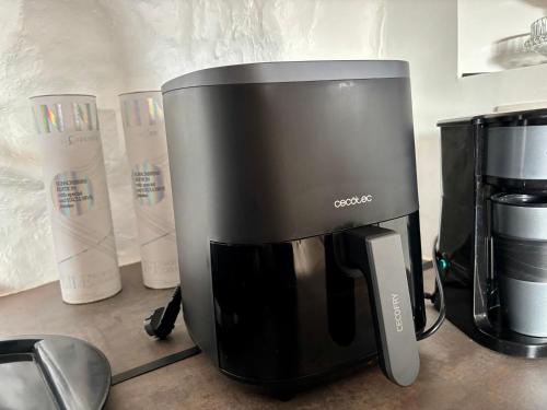 a coffee maker sitting on top of a counter at Casa Halcón in Jávea