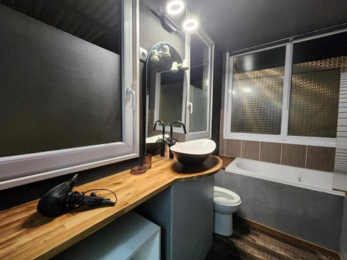 Vannituba majutusasutuses Maison avec 2 chambres Naval et Orano