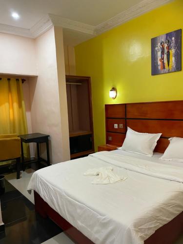 Postel nebo postele na pokoji v ubytování HÔTEL Michou