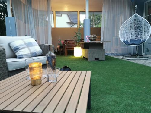 Posezení v ubytování Ház a Tónál Villa Apartman