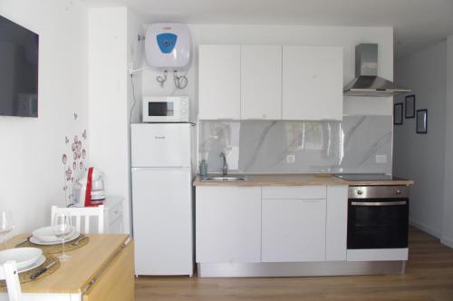 Kuchyň nebo kuchyňský kout v ubytování Sonnen & Mar