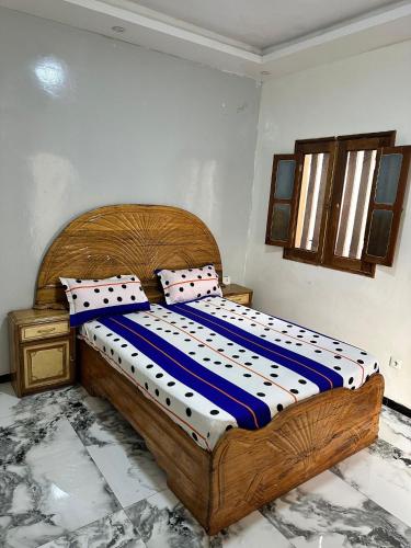 Ένα ή περισσότερα κρεβάτια σε δωμάτιο στο Badji