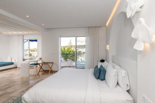 Ένα ή περισσότερα κρεβάτια σε δωμάτιο στο Neira Boutique Hotel & Spa