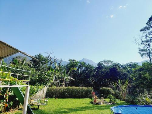 Κήπος έξω από το Desfrute no pedaço do paraíso - Recanto das Águas