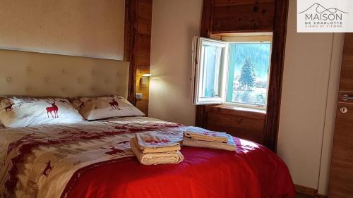 En eller flere senge i et værelse på La Maison de Charlotte - Val di Fiemme