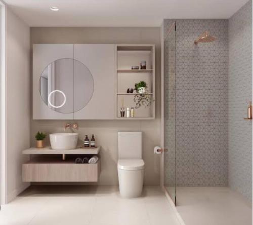 Ένα μπάνιο στο Luxury Beachside Apartment