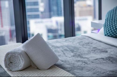 Postel nebo postele na pokoji v ubytování Luxury Beachside Apartment