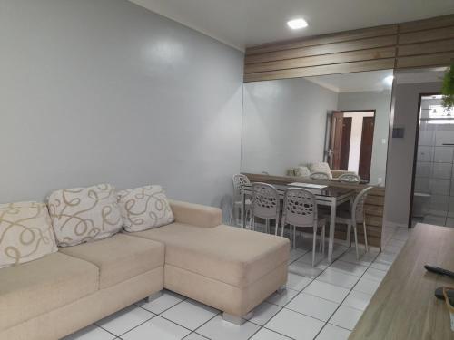 Khu vực ghế ngồi tại Apartamento Cohama São Luís