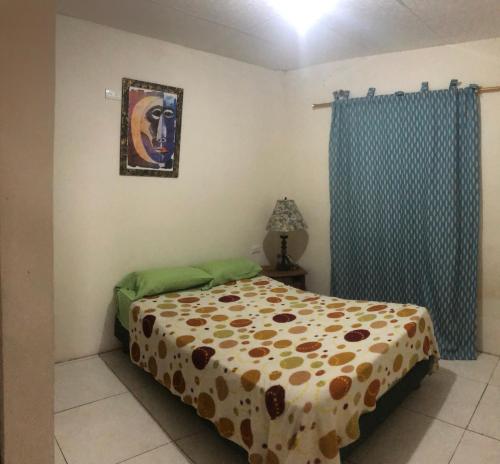 Ένα ή περισσότερα κρεβάτια σε δωμάτιο στο hospedaje Maluli 04