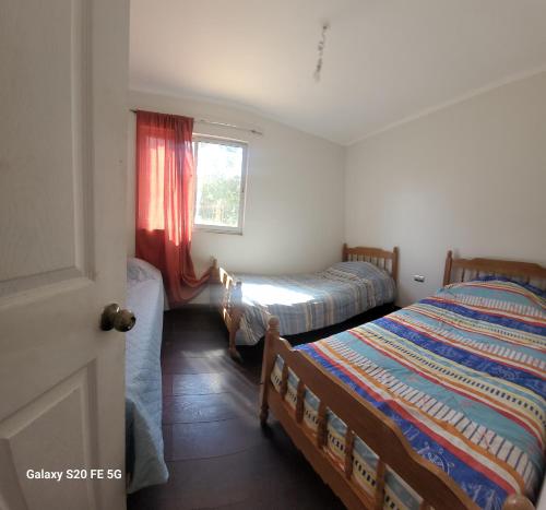 Ένα ή περισσότερα κρεβάτια σε δωμάτιο στο CABAÑAS SALTOS DEL LAJA Duende Lientur