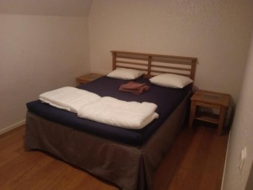 En eller flere senge i et værelse på Lugnt läge för 1-4