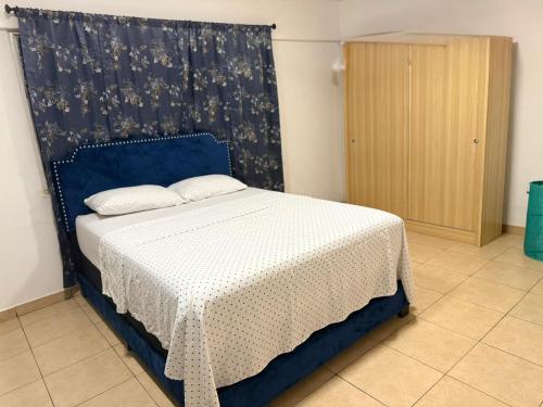 Ένα ή περισσότερα κρεβάτια σε δωμάτιο στο Sigma Theta Homes - KNUST Area