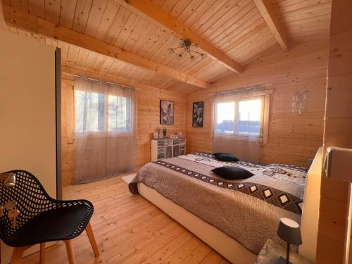 Ένα ή περισσότερα κρεβάτια σε δωμάτιο στο Magnifique chalet cosy