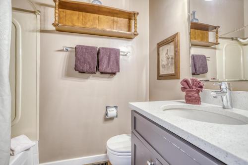 a bathroom with a sink and a toilet at Sea-Esta in Lincoln City