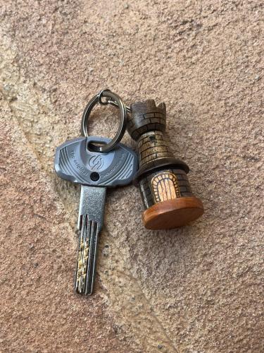 a pair of keys on a key chain at L'Angolo della Torre in Bevagna