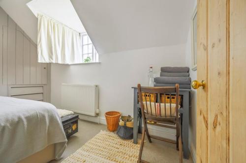 Postel nebo postele na pokoji v ubytování The Secret Cottage