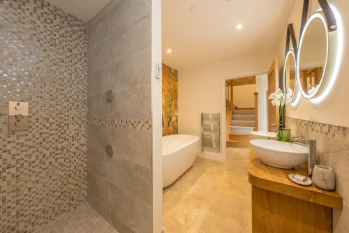 Koupelna v ubytování Llety-Cariad