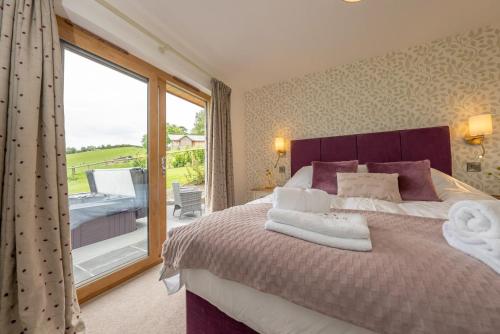 Ένα ή περισσότερα κρεβάτια σε δωμάτιο στο Llety-Hiraeth