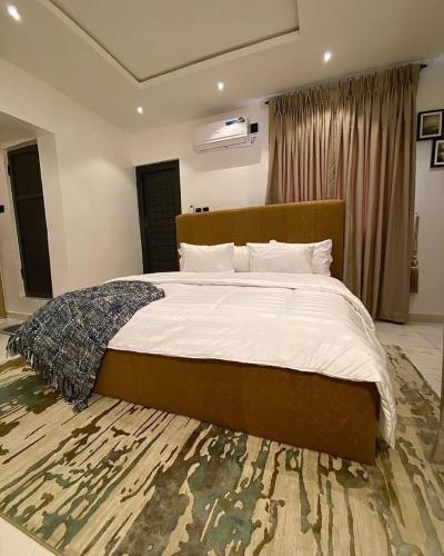 Una cama o camas en una habitación de Umba