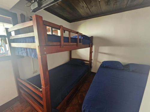 Un pat suprapus sau paturi suprapuse la Hotel Pura Vida