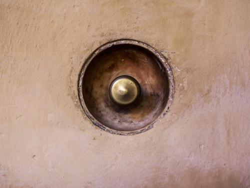 a close up of a metal drain in a sink at Casa Isolani Charms Rooms Santo Stefano in Bologna