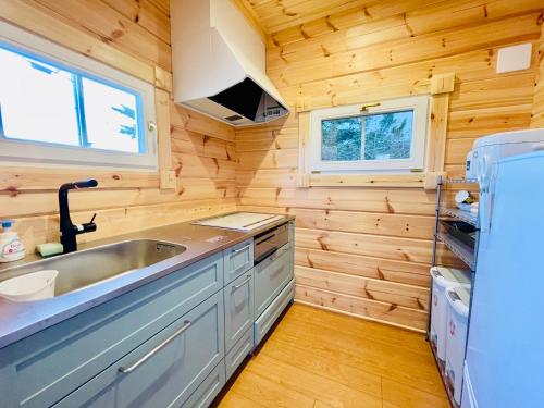 Η κουζίνα ή μικρή κουζίνα στο 山中湖レイクサイド1号館