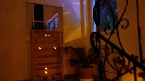 a room with a dresser and a dresser with a mirror at La Fontaine Apartments in Kandia