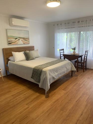 Ένα ή περισσότερα κρεβάτια σε δωμάτιο στο Villa 36 Retreat Hervey Bay